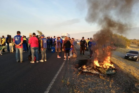 Trabajadores en la ruta.