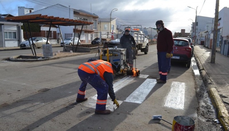 Trabajadores en calle San Martín.