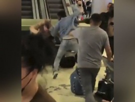 Escenas dramáticas en el aeropuerto: piñas y armas de fuego en una pelea