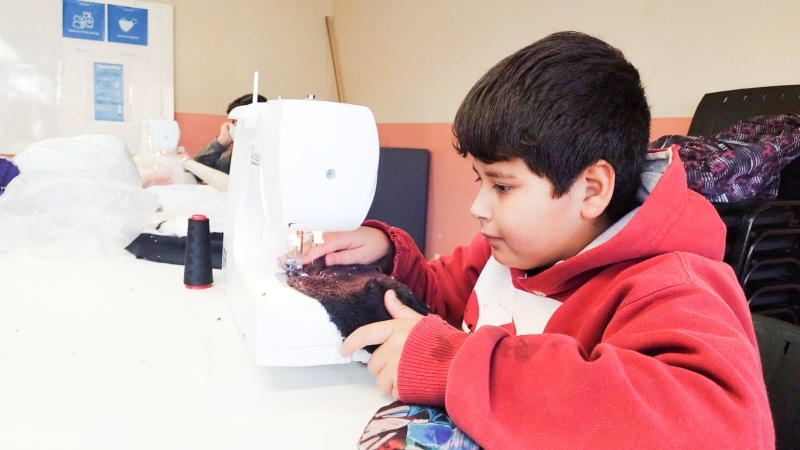 Alumnos del taller de costura en la “Expo Taller”.